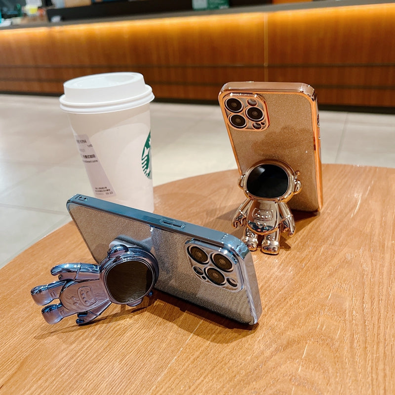 Étui en silicone pliant d'astronaute à paillettes de luxe avec support et support de main pour Apple iPhone | Antichoc, hydrofuge et sans traces de doigts